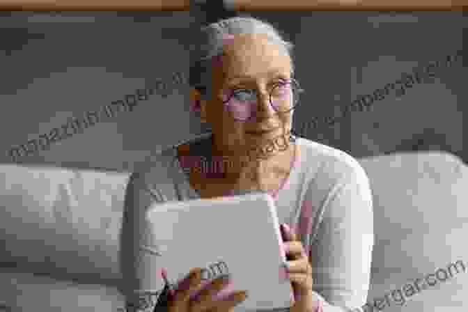 Elderly Woman Smiling While Using A Tablet Elder Care Updates For 2024