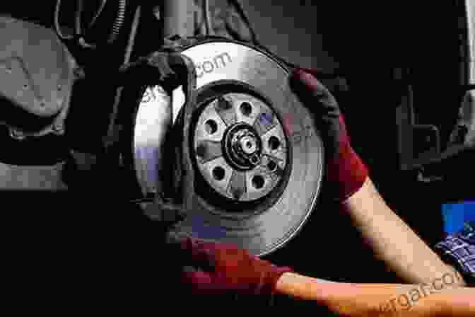 Mechanic Repairing A Brake On A Car An To Motor Car Servicing For Beginners : With Practical Exercises