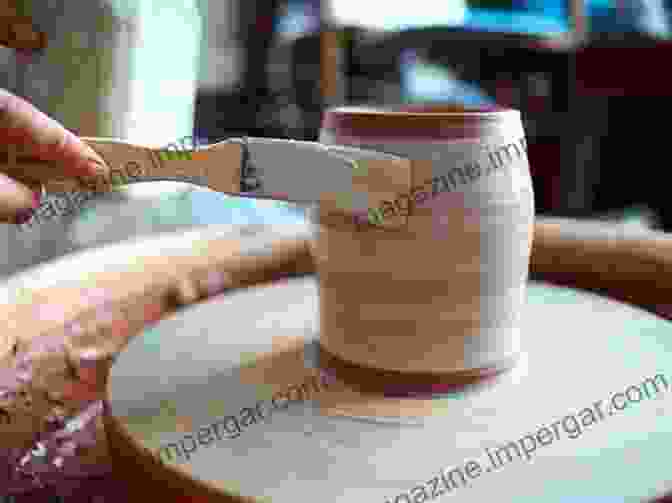 Potter Applying Glaze To Pottery POTTERY WHEEL FOR BEGINNERS: Practical Step By Step Illustration Guide To Pottery Wheel